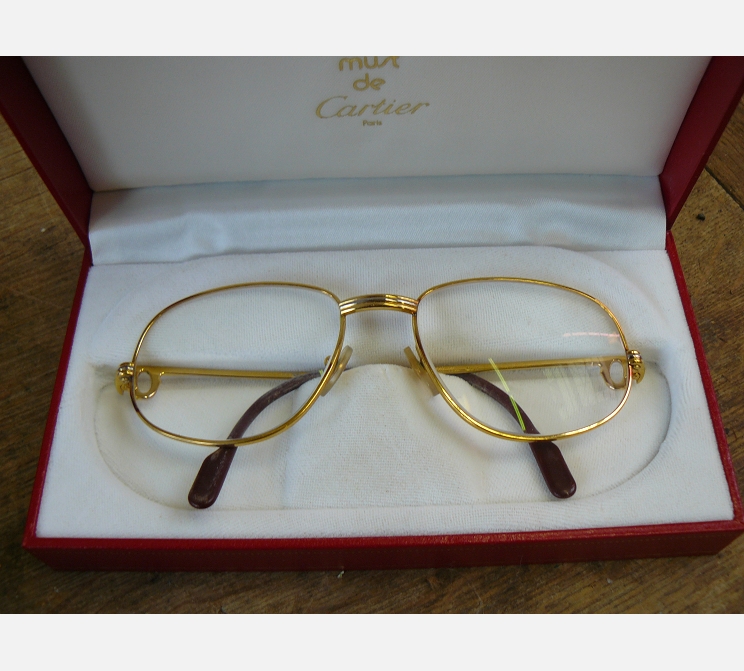 Paire de lunettes OR||MUST DE CARTIER